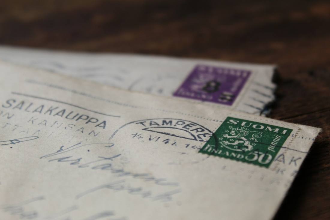 Old handwritten letters and family keepsakes