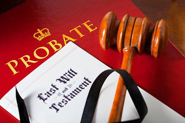A probate book, a last will and testament, and a gavel